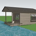 Wooden House With Solar Panel Roof And Wooden Deck By Waterfront