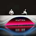 Modern Reception Desk With Blue LED Lights Pink Purple ETHYRIA Display And Two Staff