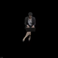 Business Woman In Suit And Skirt Using Laptop While Sitting With Crossed Legs
