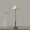 Minimalist Floor Lamp With Beige Lampshade And Black Pole In Modern Interior