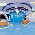 Innovative Tech Classroom With Blue Walls Gear Decorations Globe Lights And Robot Arms