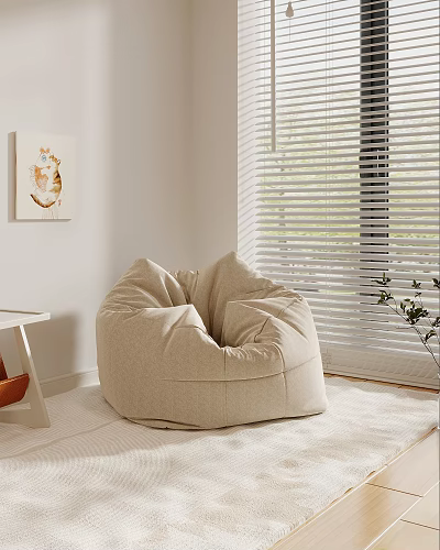 Beige Bean Bag Chair In Bright Room With Window Blinds Small Table Wall Art And Plant 3d model