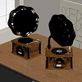 Vintage Instruments and Art Supplies Featuring Gramophones on Wooden Table by Window with Geometric Artwork
