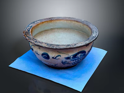 Carved Ceramic Basin With Blue And White Patterns On Blue Paper Background 3d model