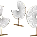 Three Modern Metal Screens With Radial Lines And Circular Design On Golden Stands For Home Decor