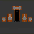 Computer Speaker System Featuring Multiple Orange Speakers And Black Central Unit On Display Platform