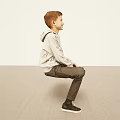 Man Wearing Gray Hoodie Dark Pants Striking Unique Pose Against White Background