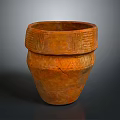 Terracotta Clay Pot With Cracked Surface And Intricate Carved Patterns