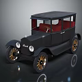 Vintage Black Classic Car With Red Interior And Gold Spoke Wheels
