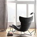 Black Modern Lounge Chair With Ottoman Leather Upholstery Metal Frame Dark Background And Wooden Floor