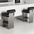 Black Padded Bar Stools with Stainless Steel Legs in Modern Kitchen White Countertop