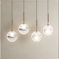 Elegant Modern Pendant Lights With Round Textured Glass And Gold Frames