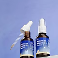Premium Pet Food Supplements With Fish Oil For Dogs And Cats In Dropper Bottle Design