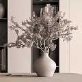 Modern Minimalist Floral Art Display With Vase And Foliage Branches On Bookshelf