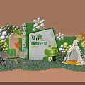 Spring Themed Photo Check In Spot with Green Decorations Flowers Balloons Tent and Tables Chairs