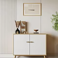 White Entryway Console Cabinet With Gold Handles On Striped Wall Decorative Items And Green Plant