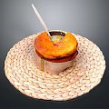 Creamy Soup in Pastry Crust Bowl on Woven Mat with Wooden Spoon