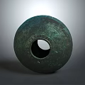 Ancient Bronze Sculpture Featuring Circular Form Intricate Patterns And Central Hole 3d model