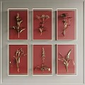 Wall Decor With Golden Plants On Red Background In Gold Frames 3d model