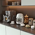 Modern Kitchen Black Marble Countertop With Coffee Machine Blender Jars Cups And Cabinets