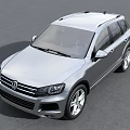 Silver Volkswagen SUV With Front Grille Design And Alloy Wheels On Open Road