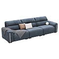 Brown And Blue Three Seater Sofas With Pillows Throw Blanket And Decorative Balls
