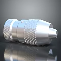 Silver Metal Household Tool With Textured Grip And Cylindrical Design