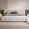 Modern Double Bed With Upholstered Headboard Quilt Pillows And Bedside Tables In Minimalist Bedroom