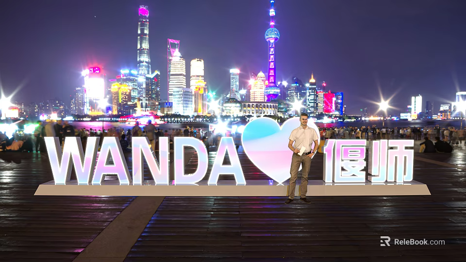 3D Wanda Letters Illuminated Against Night City Skyline With Skyscrapers Person And Heart Shape 3d model 