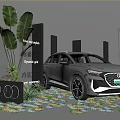Audi Electric SUV Showcased In Outdoor Display Area With Green Plants And Signage