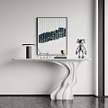 Modern Minimalist White Curved Console Table With Sculpture Wall Art And Table Lamp