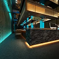 Modern Japanese Restaurant Interior With Stylish Blue Lighting And Wooden Dining Tables