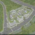 Modern Industrial Factory Complex With Green Roofs Surrounded by Trees and Roads