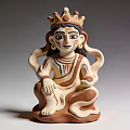 Terracotta Landscape Sculpture Of Seated Figurine With Crown Painted Face And Curled Hair