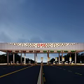Highway Toll Station With Multiple ETC Lanes And Road Under Clear Sky