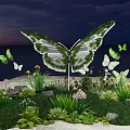 Stunning Butterfly Sculpture Photo Spot With Green Plants Flowers And Sunset Sky