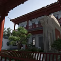 Traditional Chinese Ancient Architecture Featuring Red Pillars Carved Eaves and Courtyard Trees