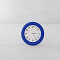 Minimalist Round Blue Frame Table Clock With White Dial And Black Numbers