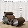 Brown Cylindrical Design Single Sofa With Metal Accents And White Spiral Lamp On Wooden Floor