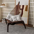 Brown Rattan Leisure Chair With Soft Cushions Against Lattice Wall Abstract Painting And Floor Lamp