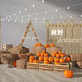 Autumn Themed Decorative Setup With Pumpkins Hay Bales Wooden Frame And String Lights