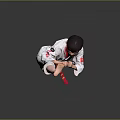 Young Boy In Taekwondo Uniform With Red Belt Striking High Kick Stance