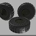 Three Tires With Honeycomb Structure Deep Tread Pattern And Green Hub 3d model