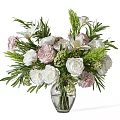 Elegant Floral Arrangement In Clear Glass Vase With White Roses Pink Blooms And Green Foliage