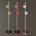 Three Modern Gold Copper Silver Floor Lamps With Two Circular Shades And Round Base Design