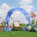 Outdoor Welcome Arch Decoration With Blue Floral Design Wooden Chair And Green Grass