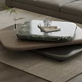Modern Geometric Coffee Table With Marble Top And Wooden Base Featuring Books And Decorative Ornament