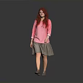 Red Haired Woman Wearing Pink Top And Gray Skirt Walking Against Gray Background
