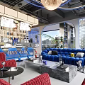 Modern Café Interior With Planet Shaped Pendant Light Blue Sofa Red Armchairs And Bar Counter