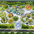 Modern Park Landscape With Circular Gardens Water Features Lush Trees And Surrounding Paths